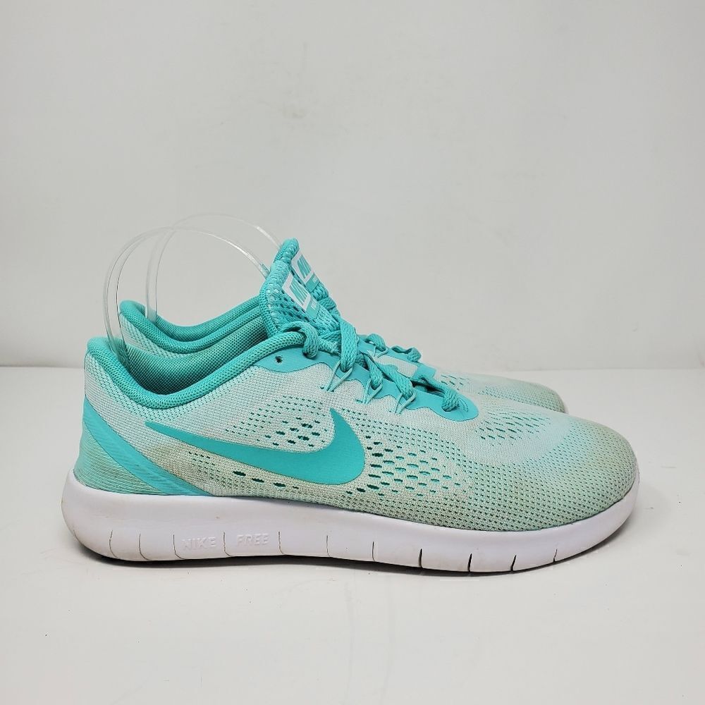 Nike free runTeal running shoesUltra light weightWorn, but lots of life left